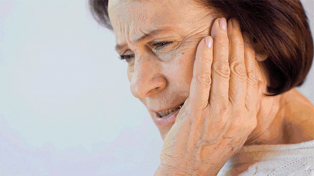 Elderly person with dental pain